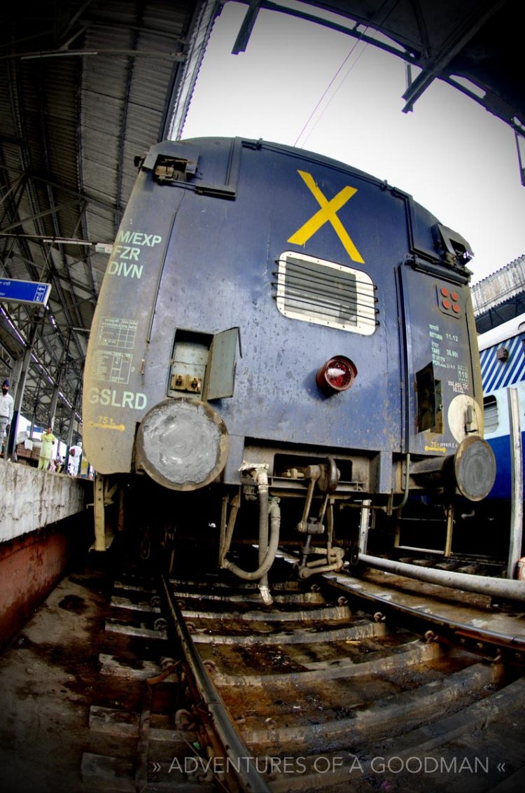 The front of an overnight sleeper train car in the station in Amritsar