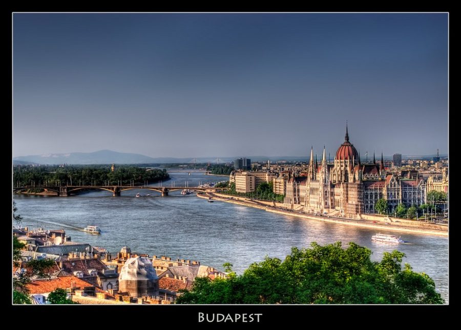 View of the Parliament and the Margaret Bridge from up in the castle hill. Processing: Photomatix blend of -2, 0, +2 exposures using details enhancer. Photoshop: - Used Photomatix to process the 0 shot with the same settings and blended it with the original over the moving boats and cars. - Imagenomic noise reduction. - Unsharp mask with radius 140. - High pass contrast enhancement except on the sky. - Slight curves contrast. - Soft light layer. - Curves with gradient over sky to darken top of sky. - Burn foreground using layer with multipy. - Slight blue filter over sky and water. - Surface blur over sky.