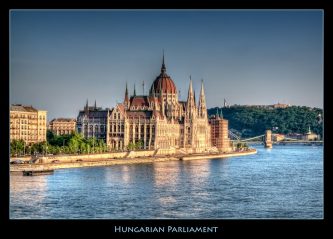 The Hungarian parliament from the opposite shore of the Danube. Processed to enhance the lazy afternoon mood. — PHOTOGRAPHY BY Pedro Szekely — http://szekelys.com/