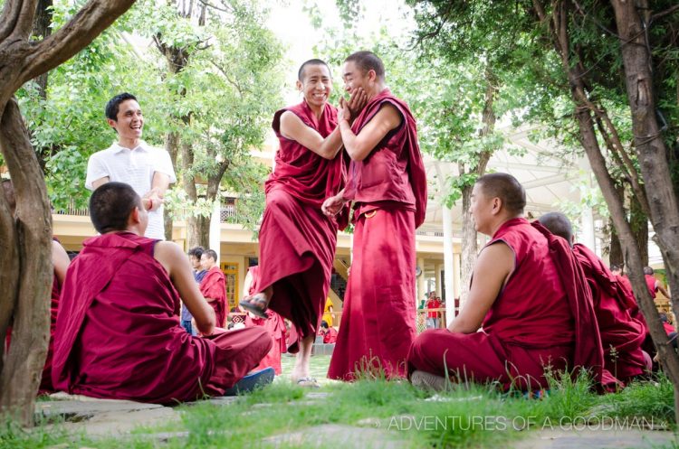 "Making up" after a friendly monk debate at the Dalai Lama Complex