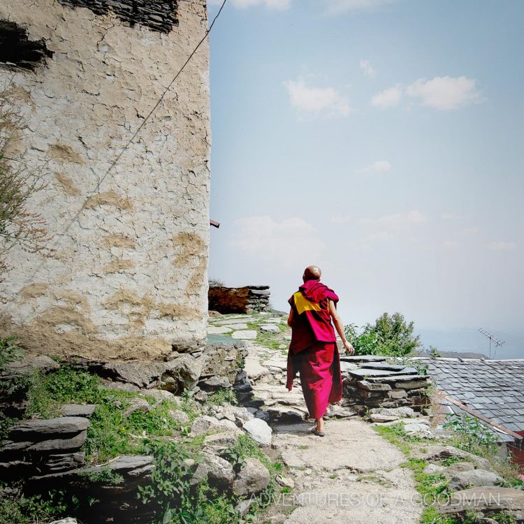 Monk walking in Upper Bhagsu, McLeod Ganj, India