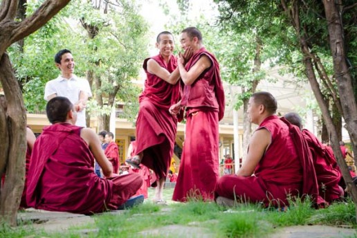 a friendly monk debate at the Dalai Lama Complex