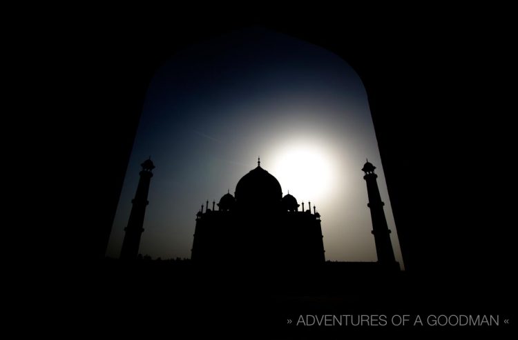 The sun sets behind the Taj Mahal in Agra, India
