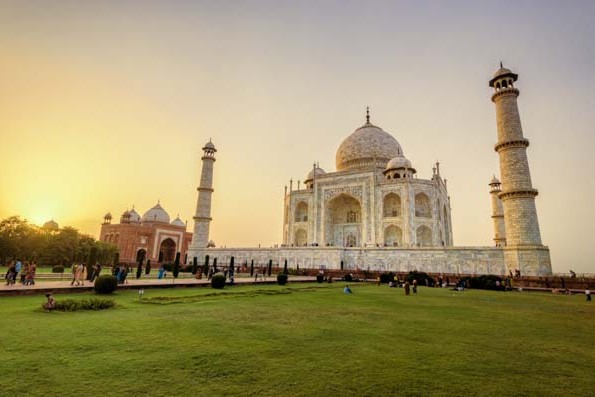 Scores of tourists enjoy the Taj Mahal in Agra, India