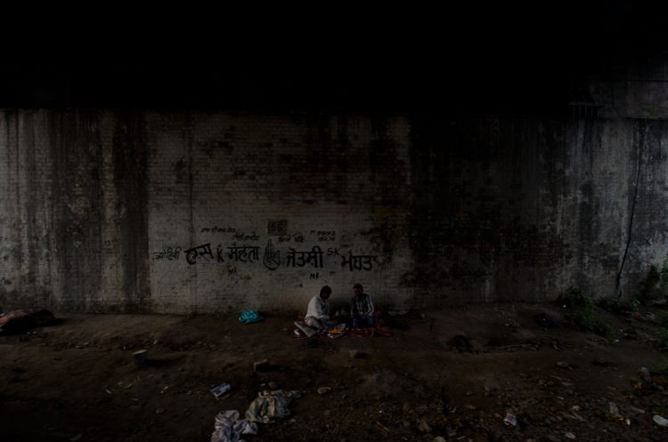 The original image, as captured from the side of a moving train approaching the Amritsar train station