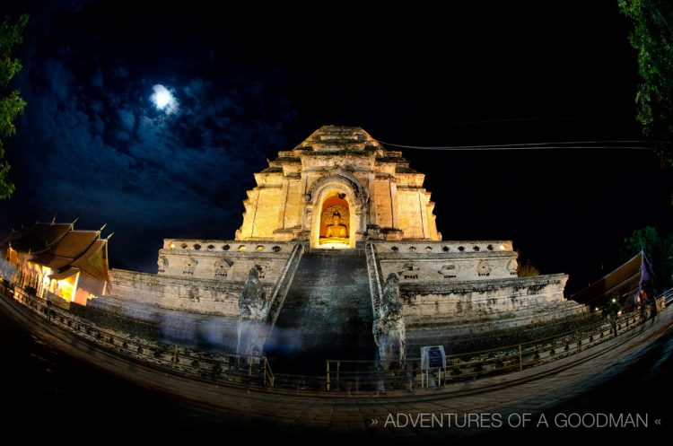 The Big Stupa at Wat Chedi Luang in Chiang Mai, Thailand, with the full moon above