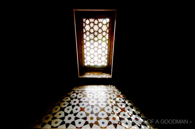Early morning light shines through the window of the Baby Taj in Agra