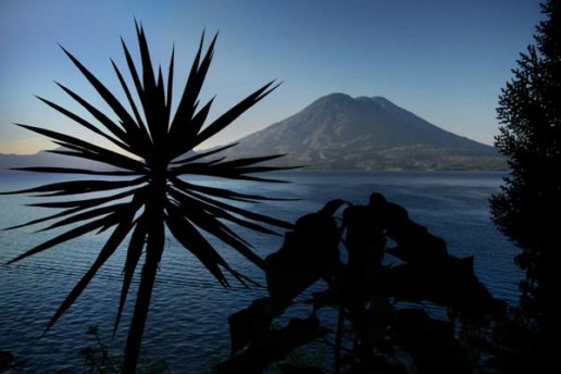 A sunrise over Lago Atitlan in Guatemala, as seen from Casa Del Mundo