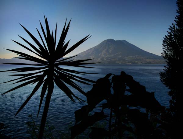 A sunrise over Lago Atitlan in Guatemala, as seen from Casa Del Mundo