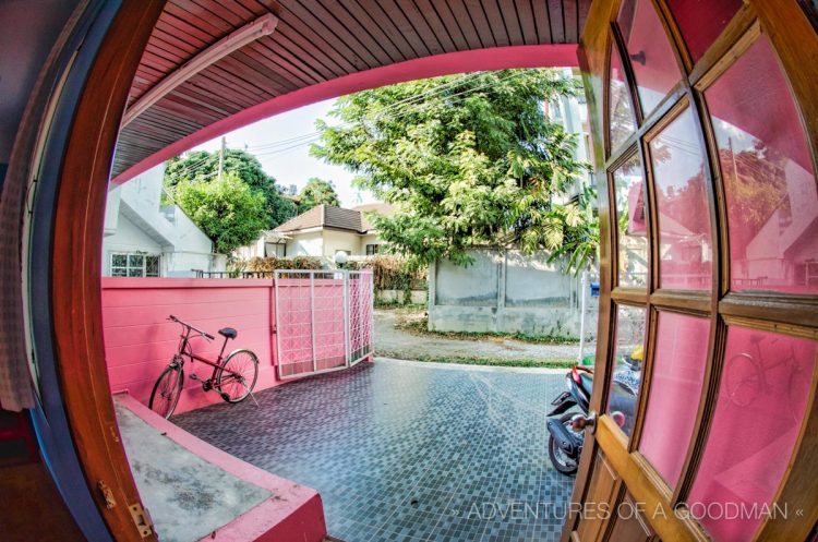 A look out the front door onto our driveway, motorbikes and bicycle