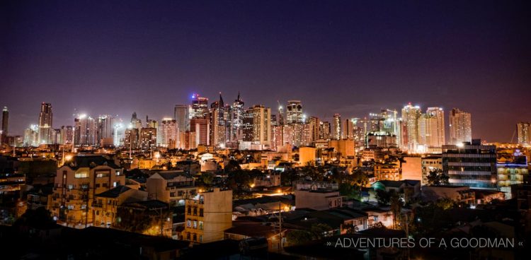 The Manila skyline on a full moon night, as seen from the Pink Manila Hostel on Pablo Ocampo Street