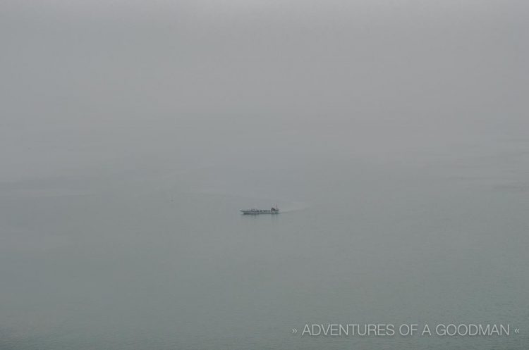 A single boat on a foggy day in Jeung-Do, South Korea