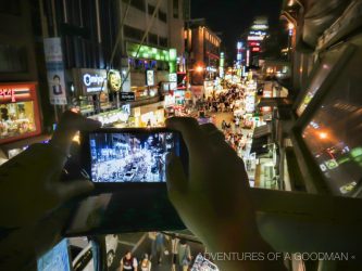 My friend Sayjin takes a camera phone photo of the Hongik University Area