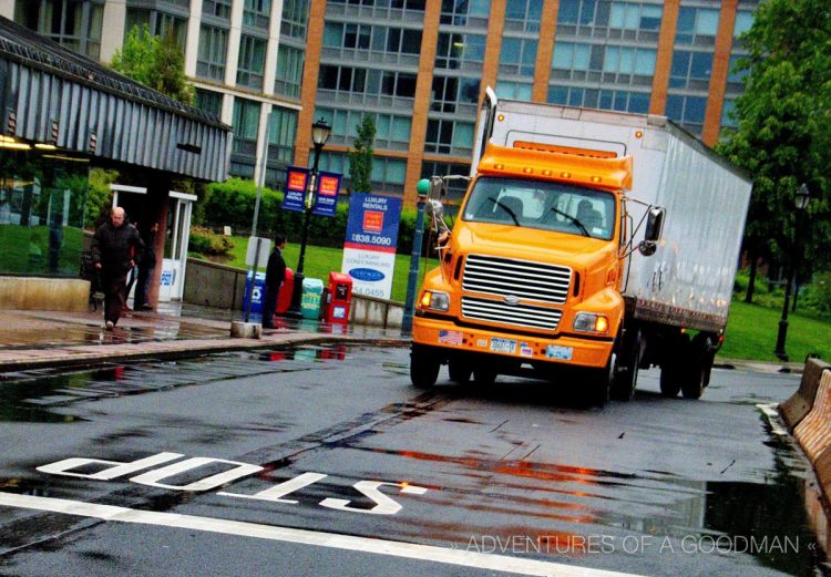 A truck drives down the street on Roosevelt Island