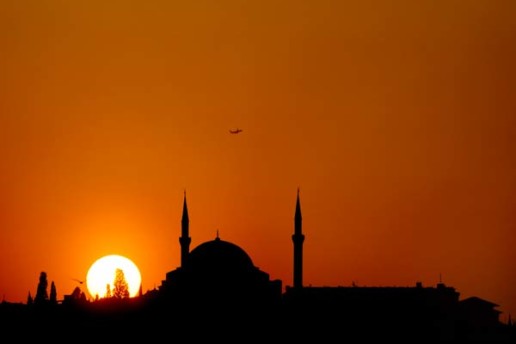 The Gul Mosque at Sunset from the Galata Bridge in Istanbul, Turkey