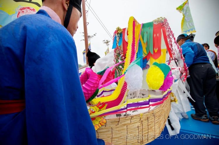 Shaman holy men carried this paper boat around the actual boat for all to see