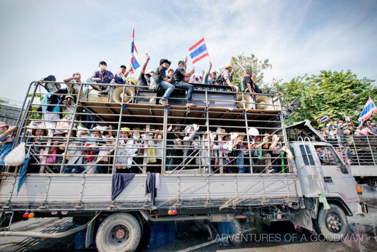 Bangkok's anti-government protesters move around town on giant trucks