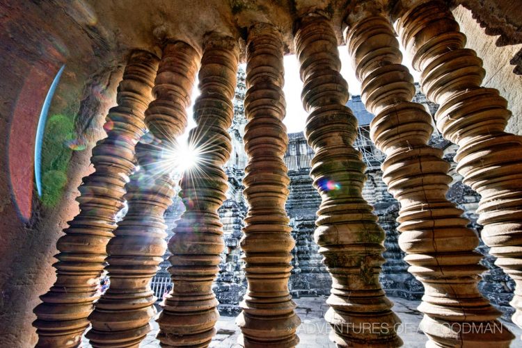 The entire second floor is surrounded by a walkway with columns covering the windows.