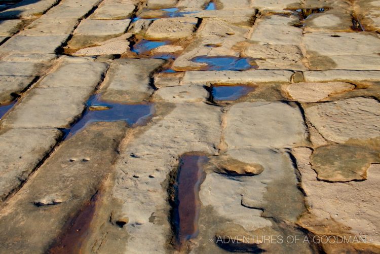 The main walkway to Angkor Wat is a beautifully reconstructed stone path.