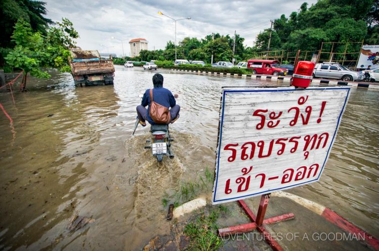 Driving through monsoon floods in Chiang Mai, Thailand