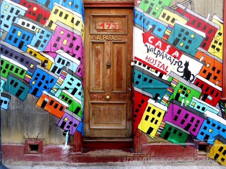 A door surrounded by street art in Valpariso, Chile