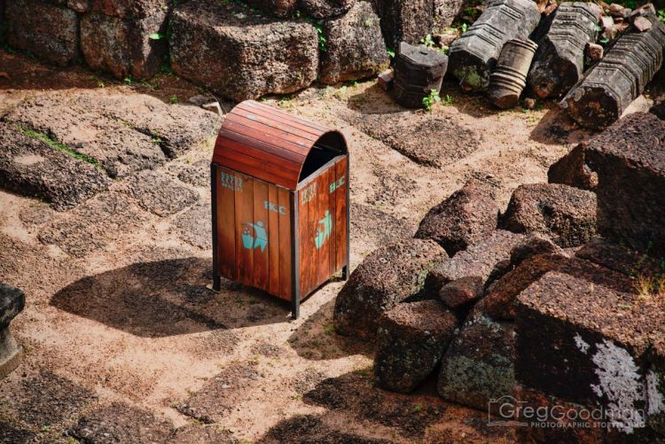 A modern trash can among the ruins of Pre Rup in Angkor, Cambodia.