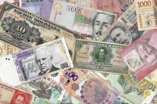 A combination of old and new currency from six South American countries