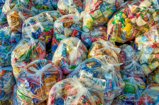Plastic bags full of alms