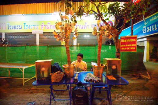 Street vendors like this one were plentiful on the walk to the 12,999 monk alms procession