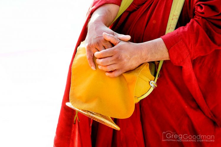 A monk and his alms bag in Chiang Mai, Thailand