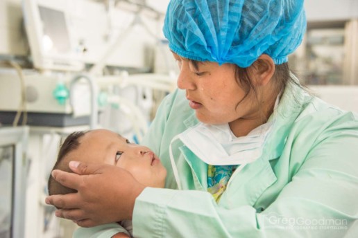 A mother is reunited with her son after cleft palate surgery in Xingyi, China