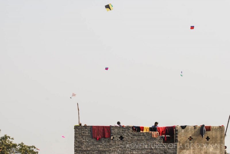 Locals fly kites during the Varanasi Kite Festival