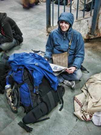 Carrie waits patiently for our train to arrive at the Agra station