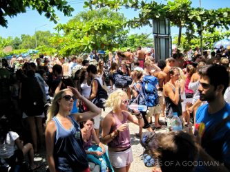 Scores of party animals waiting for a boat ride off of Koh Phangan