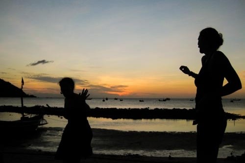 Sunrise dancing at the Full Moon Party in Thailand