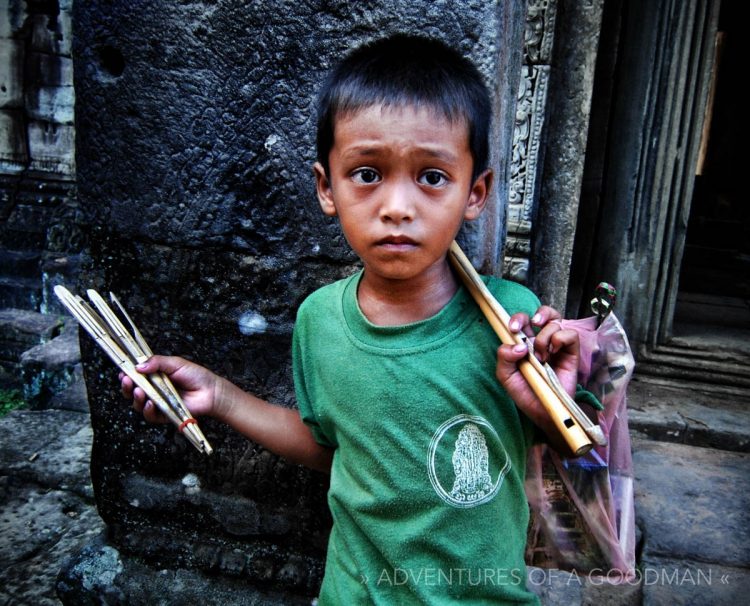 A child souvenir vendor at Banteay Kdei in Angkor, Cambodia