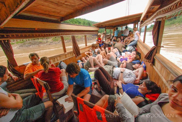 Tons of tourists crammed into a slow boat ride down the Mekong River, Laos