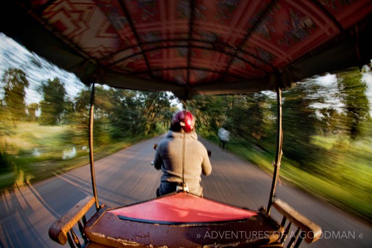 Tuk tuk driver motion blur Siem Reap Cambodia