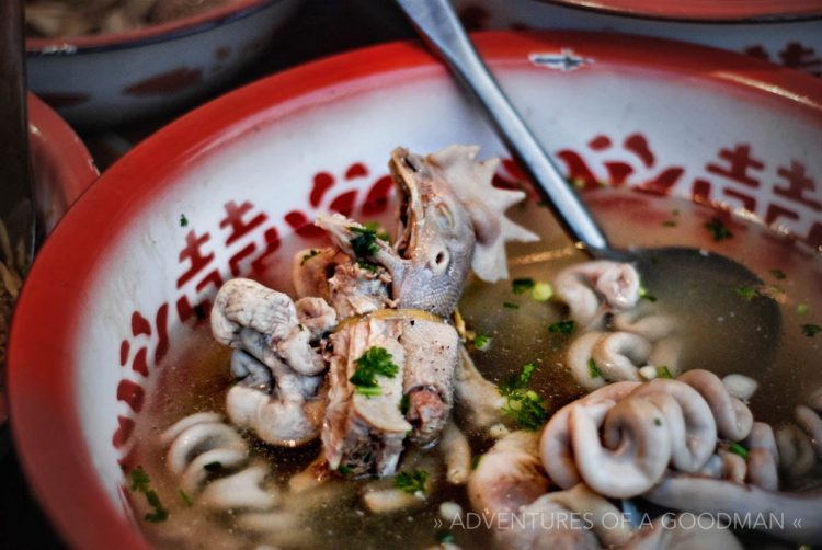 Chicken head soup in the Luang Prabang night market, Laos