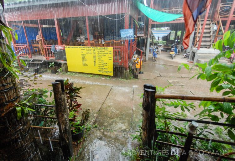 The main street of Don Det during a monsoon thunderstorm