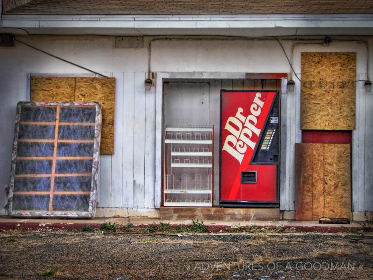 This motel may be abandoned, but the Dr. Pepper machine is still powered up