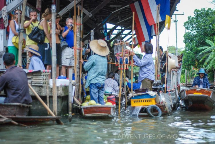 Vendors flock to tourists at the Damnoen Saduak Floating Market