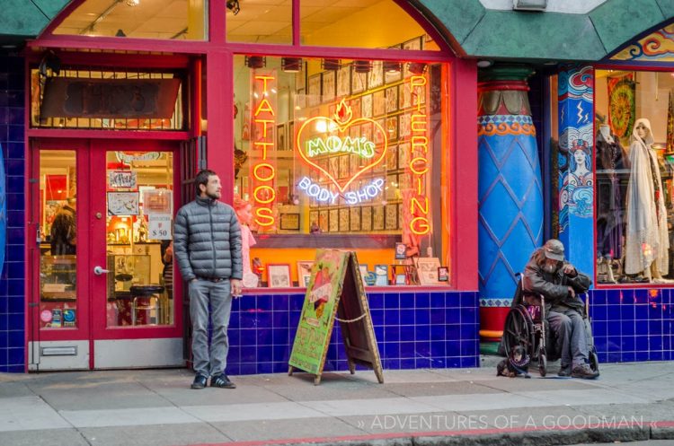 Locals hang out in front of the Mom's Body Shop tattoo parlor on Haight Street in San Francisco