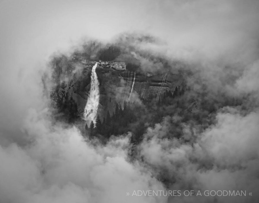 A ring of fog surrounds Nevada Falls in Yosemite National Park, as seen from Glacier Park