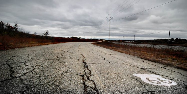 The Route 66 emblem is emblazoned on a stretch of old road in Kansas