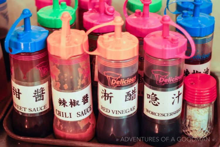 Typical condiments on a restaurant table in Hong Kong