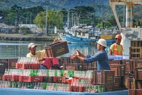 Dock workers at a pier in Honduras