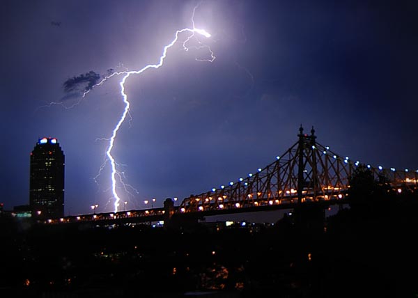 A bolt of lightning over the Queensboro Bridge and Long Island City