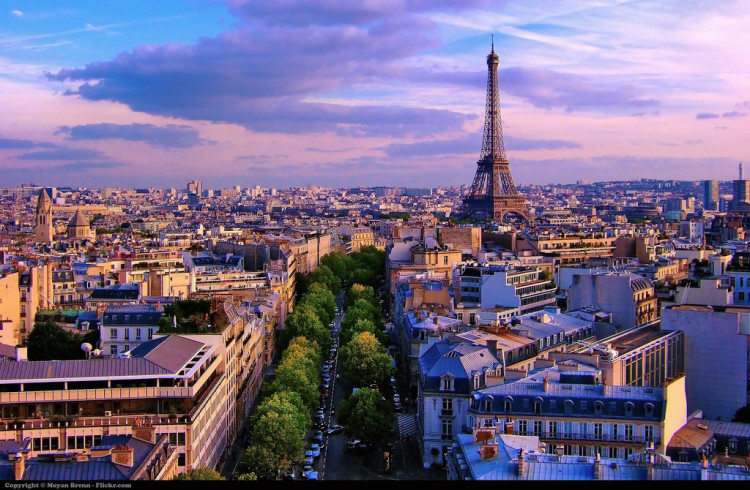 The Paris skyline at sunset — photography by Moyan Brenn