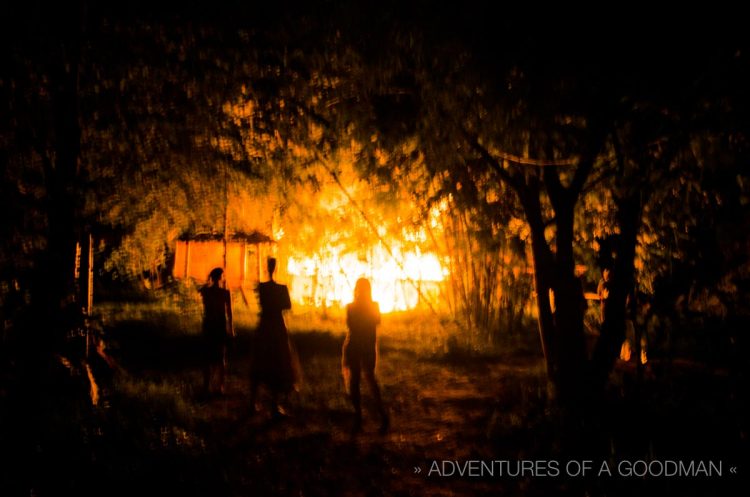 Bungalow guests at Baan Pai Riverside watch as their rooms go up in flames